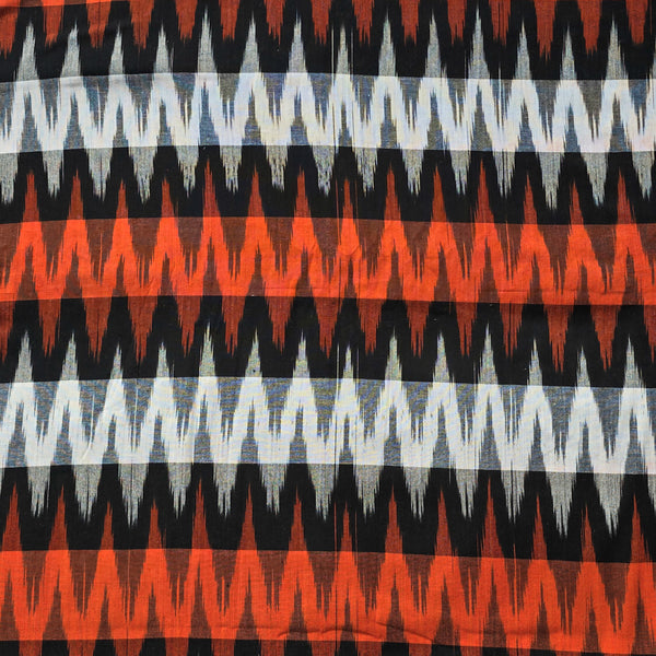 Pure Cotton Double Ikkat With Orange Black And White Zig Zag Woven Fabric