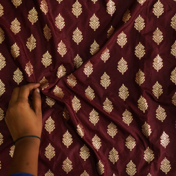 Brocade Maroon With Golden Zari Leaves Motif Fabric