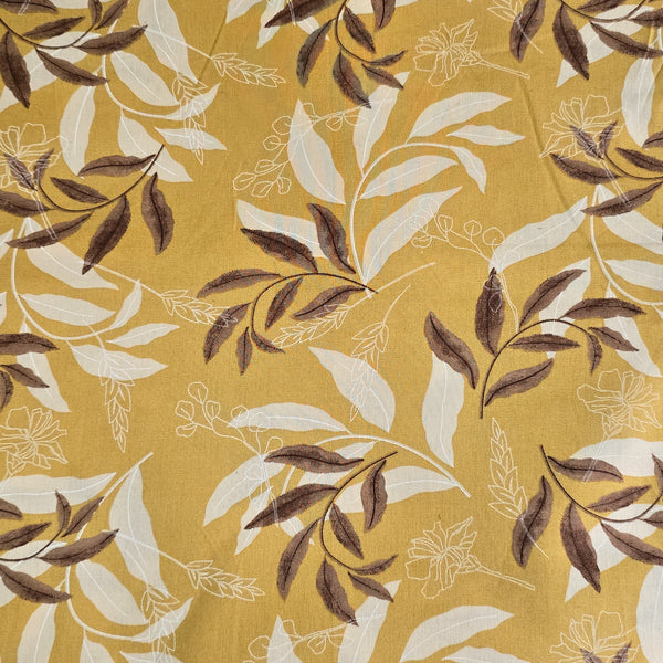 Cotton Print Flex Light Brown With White  And Dark Brown Leaves Jaal  Fabric