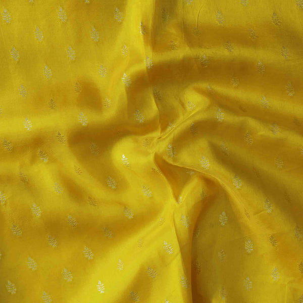 Dola Silk Yellow With Golden Zari Tiny Flower Motif Hand Woven Fabric