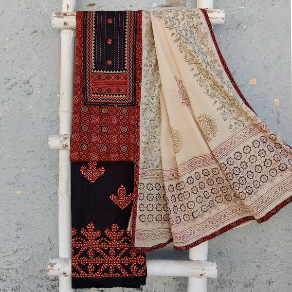 RUHI -Pure Cotton Rust With Cream Ajrak  With Black  Intricate Emboriderey Yoke Top And Black With Design Bottom And Cream Cotton Dupatta