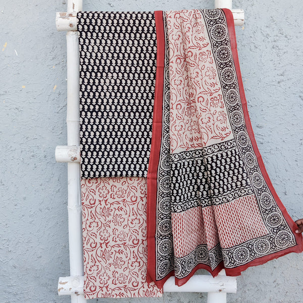 INAYA-Pure Cotton Black With Cream Small Kairi Motif Top And Cream And Red Flower Bottom With Cotton Dupatta