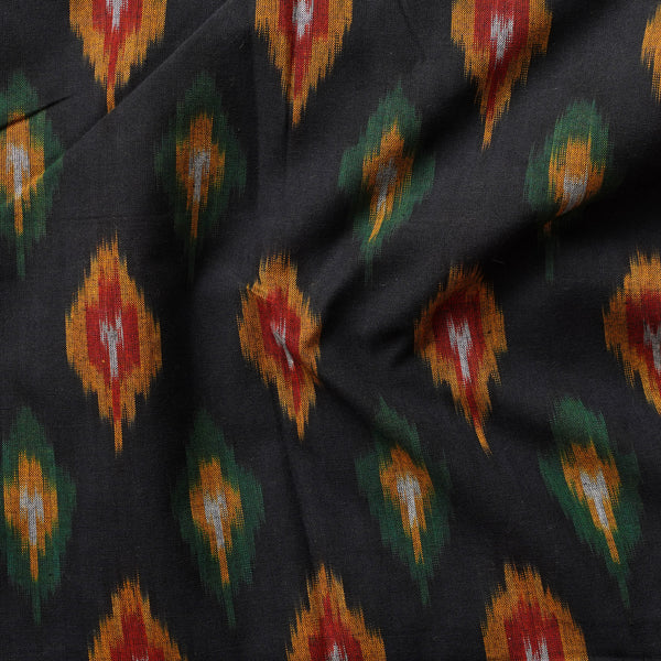 Pure Cotton Mercerised Ikkat Black With Red And Mustard Diamond Motif Woven Fabric