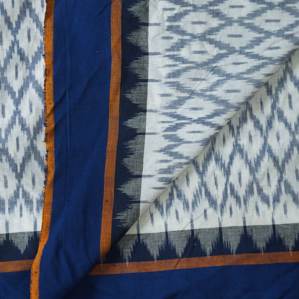 Pure Cotton Mercerised Ikkat White And Blue Jaal  And Blue Border Hand Woven Fabric