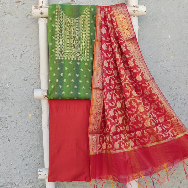 AKRITI - Cotton Silk Top With Embroidered Yoke Plain Cotton Silk Bottom And A Banarasi Dupatta Green Pinkish Orange