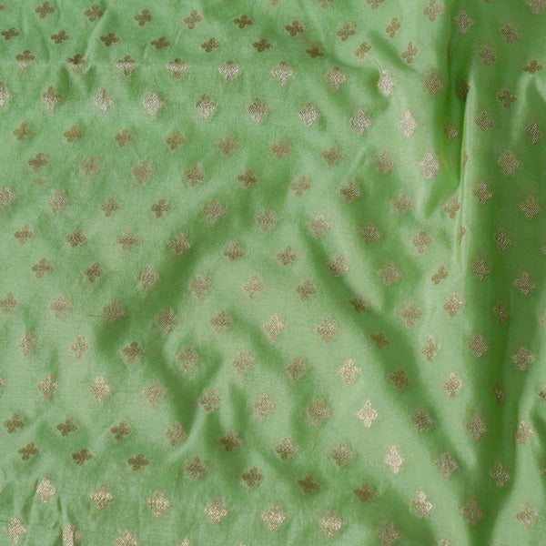 Banarasi Brocade Mint With Tiny Gold Four Petal Buttis Woven Fabric