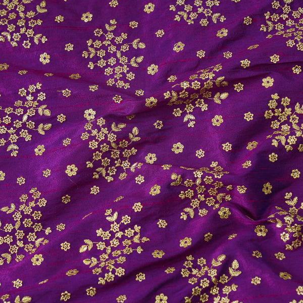 Brinjal Slub Silk Cotton With Gold Zari Flower Cluster Embroidered Fabric