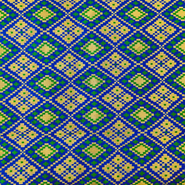 Brocade Blue With Gold And Green Patola Woven Fabric