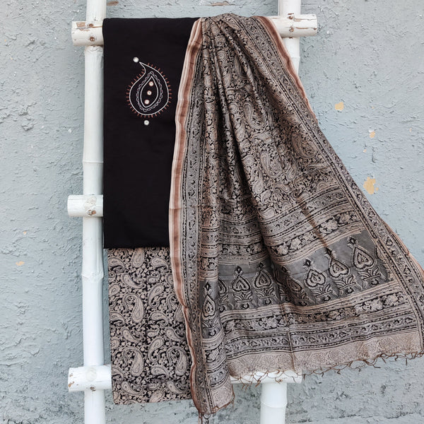 KAIRI - Pure Handloom Cotton Top With Hand Embroidered Kairi Motif Pure Cotton Kalamkari Bottom And A matching Chanderi Kalamkari Black  Duppatta Black