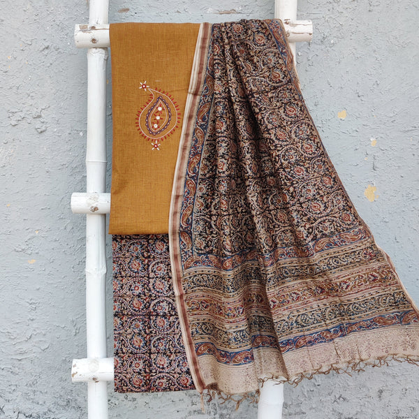 KAIRI - Pure Handloom Cotton Top With Hand Embroidered Kairi Motif Pure Cotton Kalamkari Bottom And A matching Chanderi Kalamkari Duppatta Brown Mustard