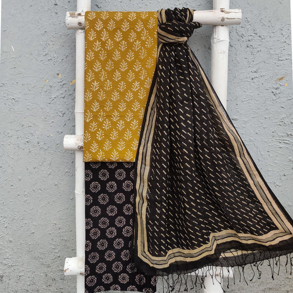 MADHU - Pure Cotton Mustard Discharge Top With Ajrak Black Bottom And Dabu Linen Dupatta