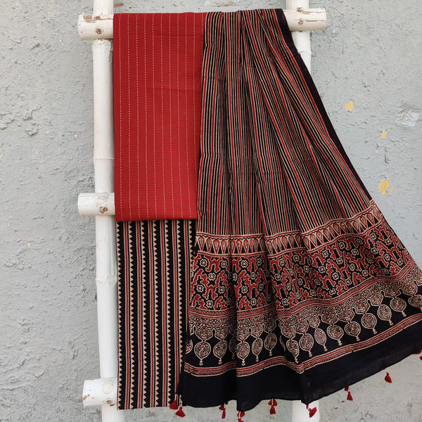 PARO - Pure Cotton Rust Top With Kaatha Stitches Black Triangle Stripes Bottom And A Cotton Tassle Dupatta