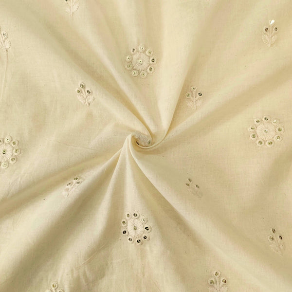 Pure Mul Cotton Cream With Tiny Sequence Flower Motif Embroidered Fabric