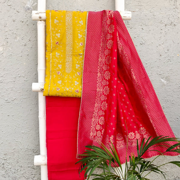 RANISA- Mustard Cotton Silk Top Fabric With All Over Beautiful Embroidery Paired With Pink Bottom Fabric And A Rich And Heavy Banarasi Dupatta